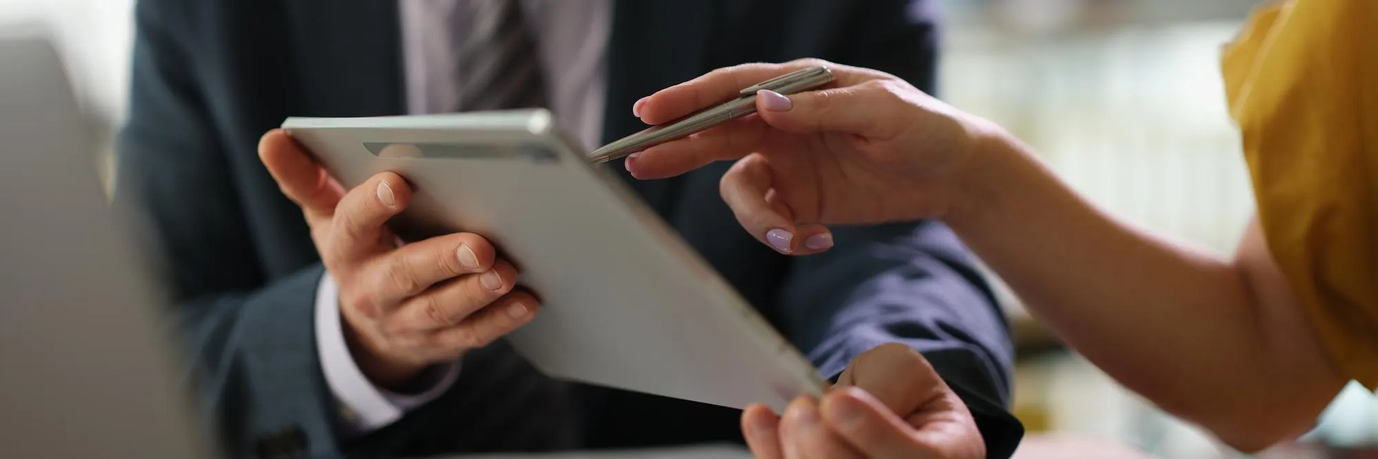 Healthcare professionals reviewing documents as part of prior authorization services.
