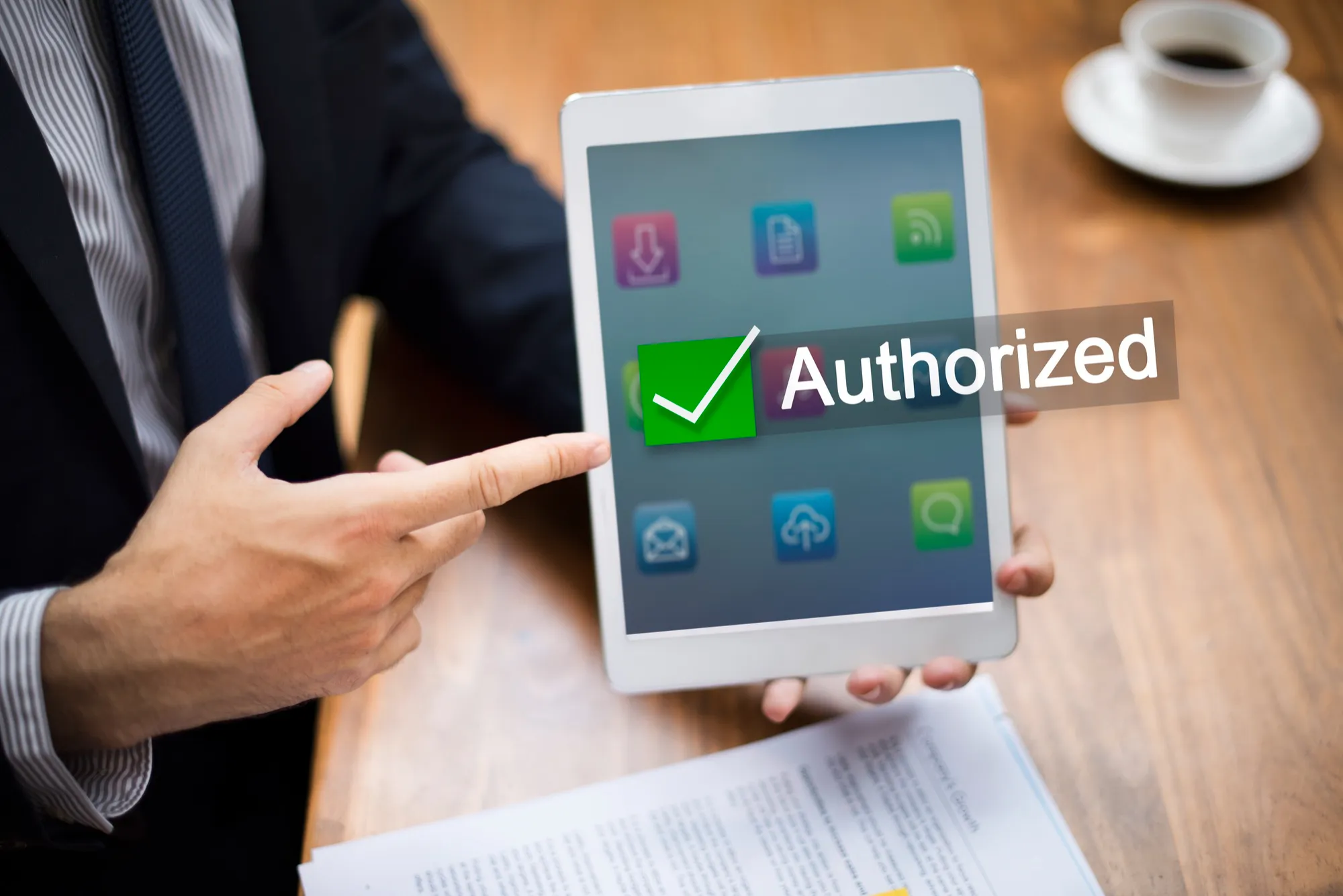 Healthcare professionals reviewing documents for prior authorization services.