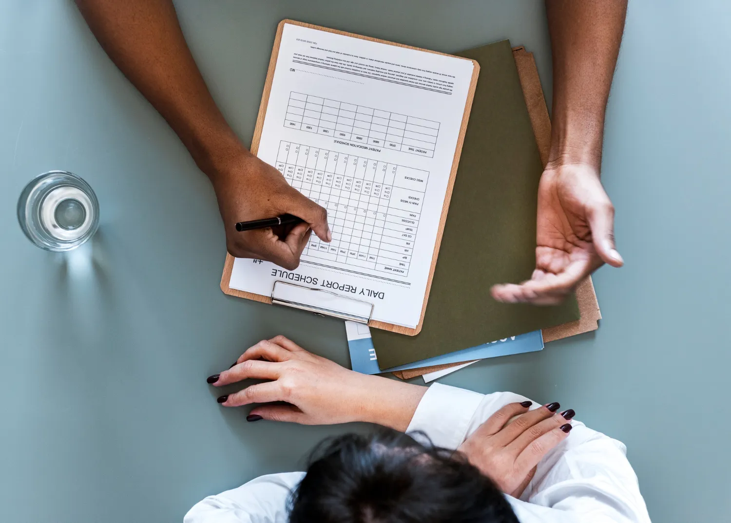Prescriber completing prior authorization forms, representing efficient prior authorization workflow and support for prescribers
