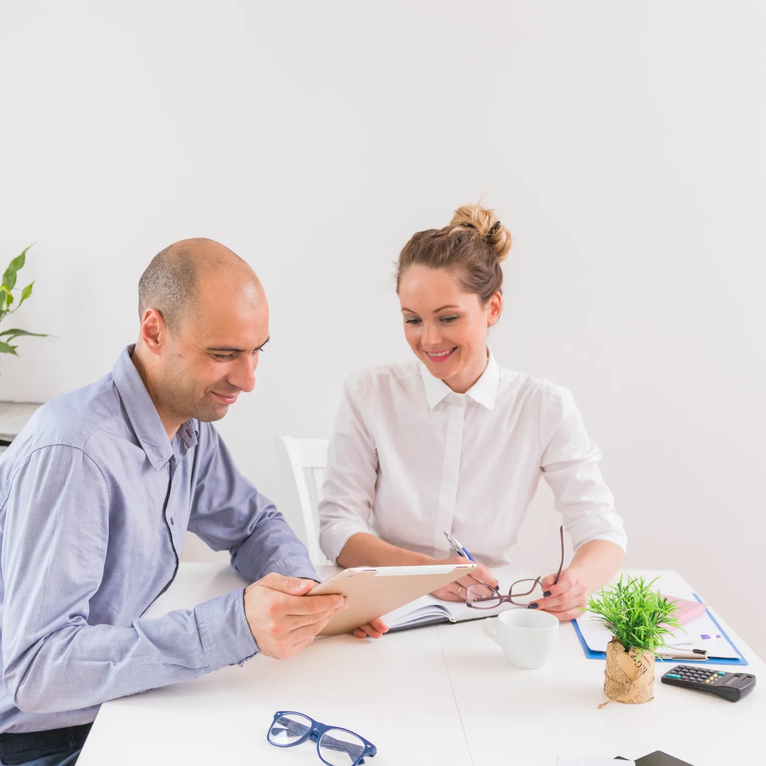 Healthcare professionals reviewing documents together, illustrating prescriber-friendly prior authorization platforms and streamlined workflow solutions