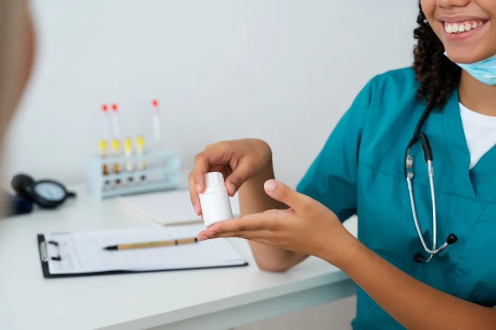 Doctor completing medical paperwork related to medication authorization and patient prior authorization assistance