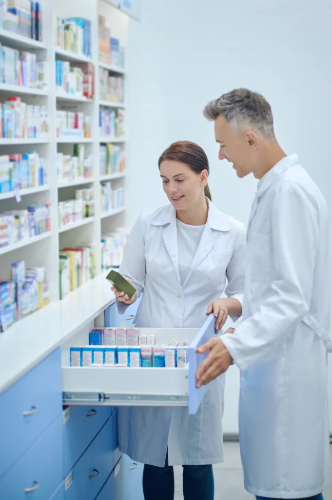 Detailed pharmacy illustration showing drug distribution, prescription handling, and integration with electronic healthcare systems for efficient medication management