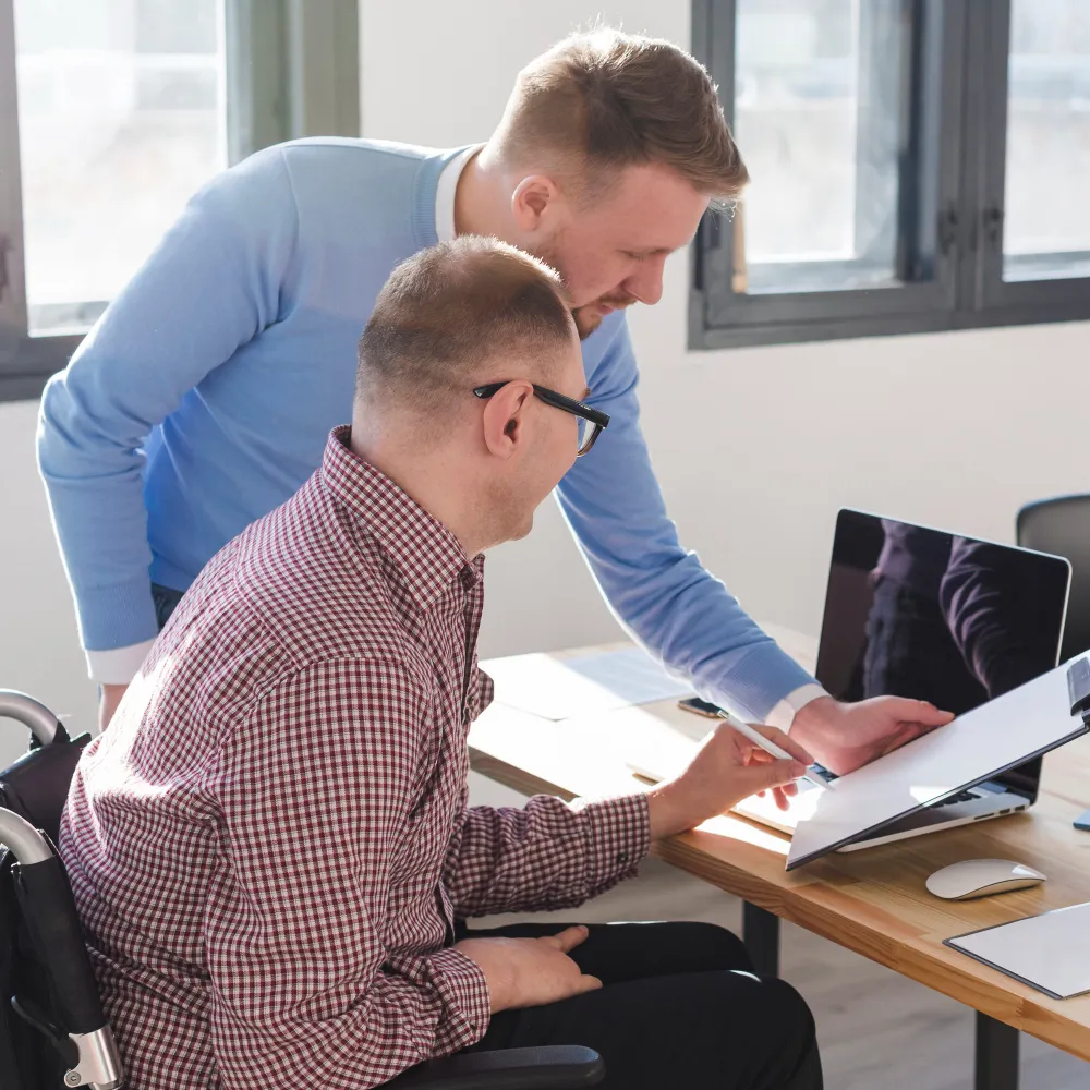 Healthcare professionals reviewing patient documentation together, demonstrating prior authorization services that streamline insurance approvals and reduce administrative delays.