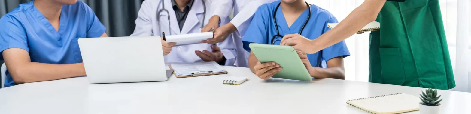 Healthcare providers collaborating on ePA pharmacy workflows using ePA prior authorization to streamline prescription approvals.
